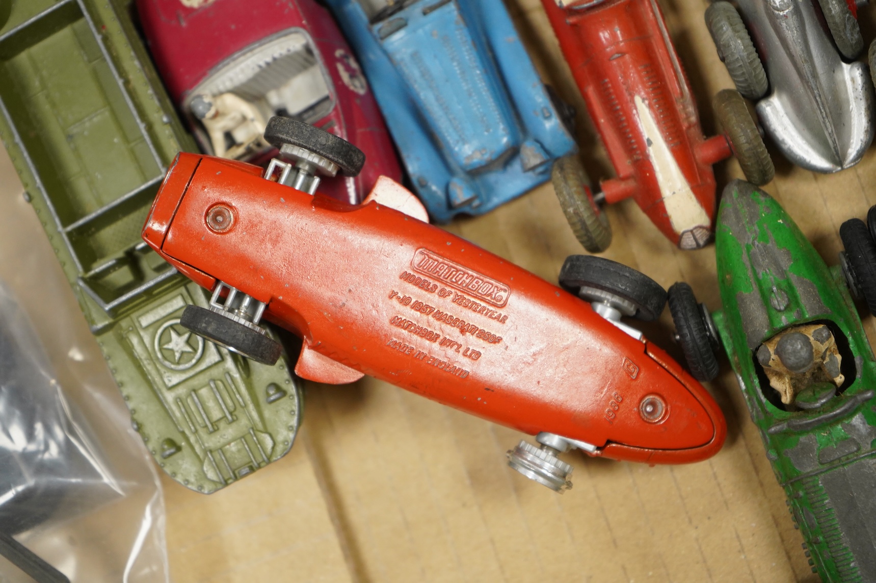 Twenty-eight diecast and tinplate vehicles by Dinky Toys, Schuco, Crescent, Corgi Toys, etc., including a good selection of single seat racing cars, three Schuco telesteering cars, etc.